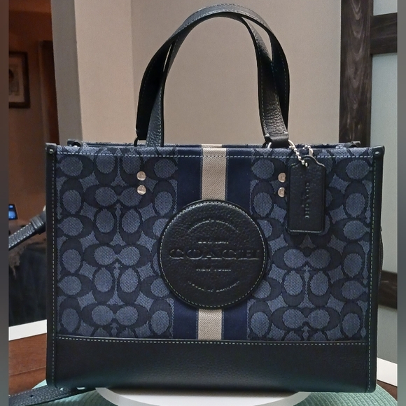 Coach Handbags - Coach Sign. Jacquard Striped Denim Dempsey Carryall Tote W/ Cross B Strap! GUC💙
